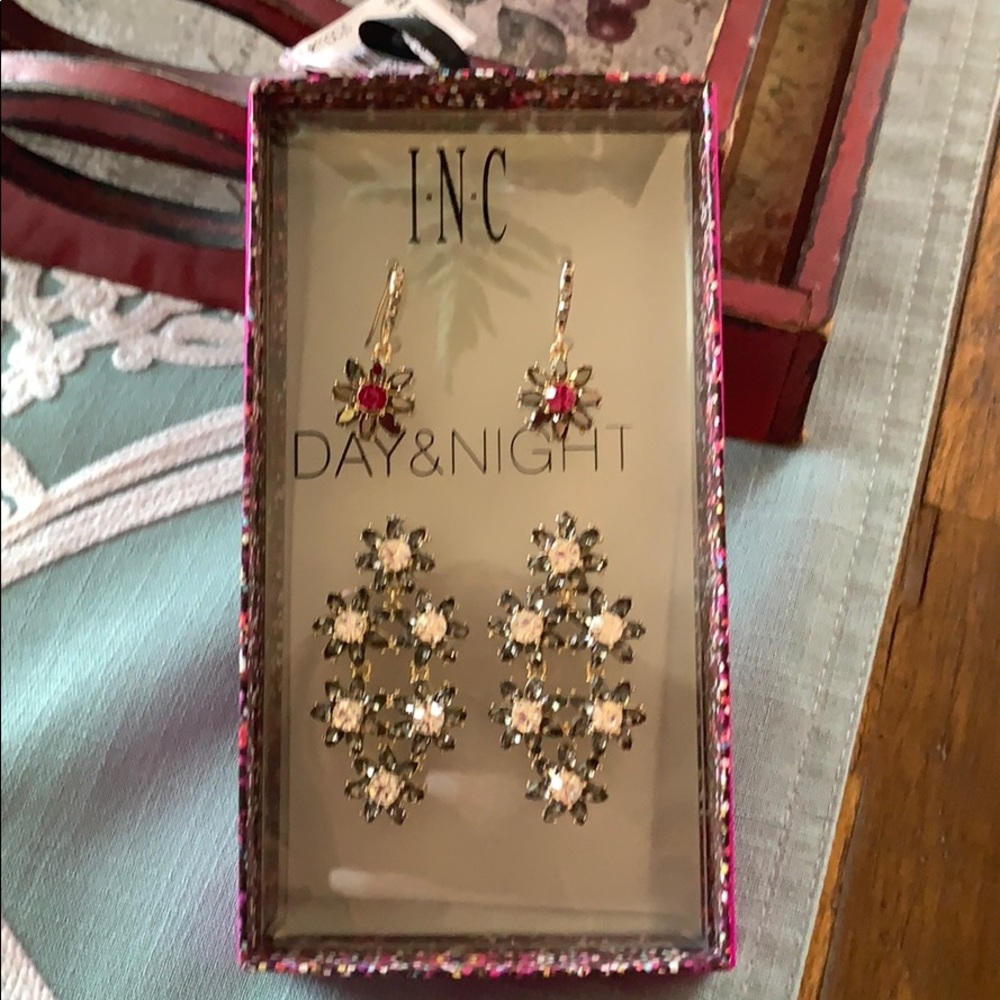 Beautiful earrings never worn , set of two .